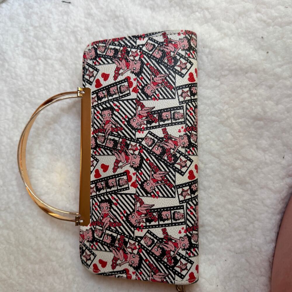 Betty boop gold chain clutch.